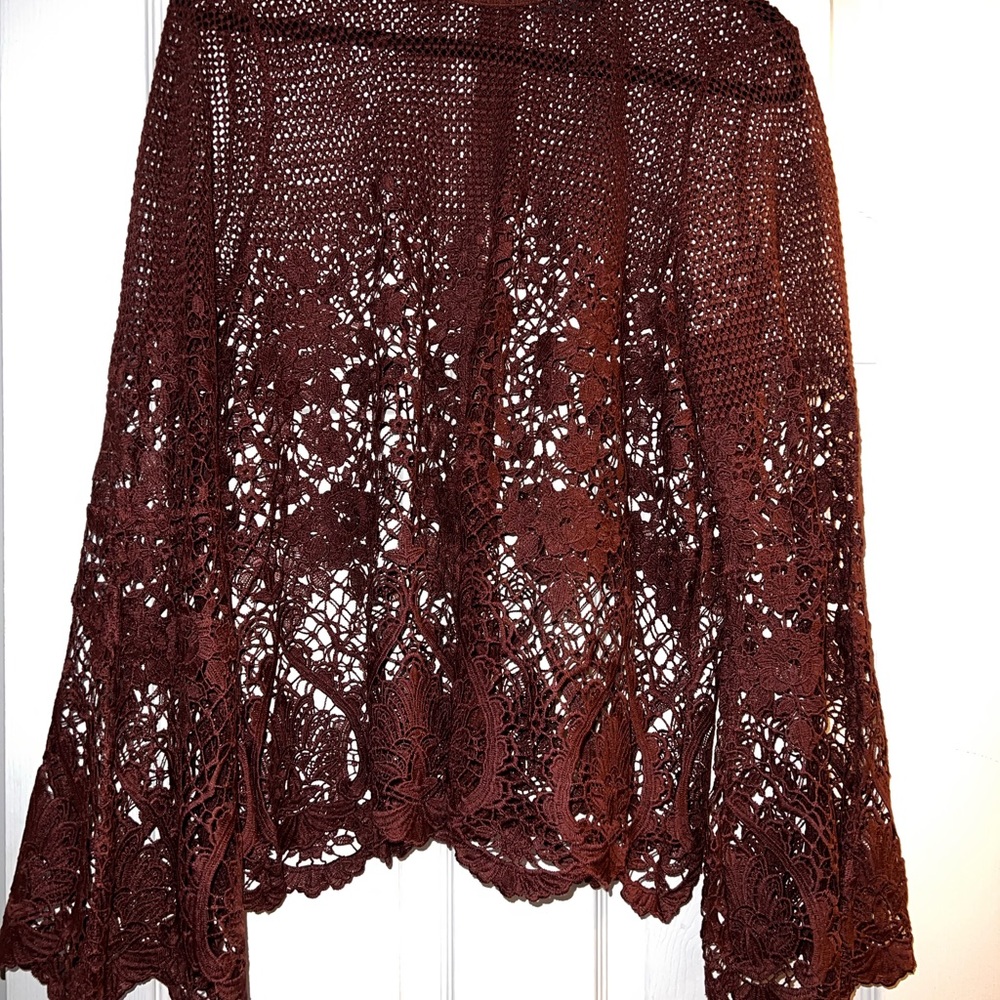 Wine color Crochet Top with gold zipper. Bell arms
